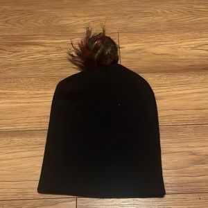 Black beanie with furry pom-pom top